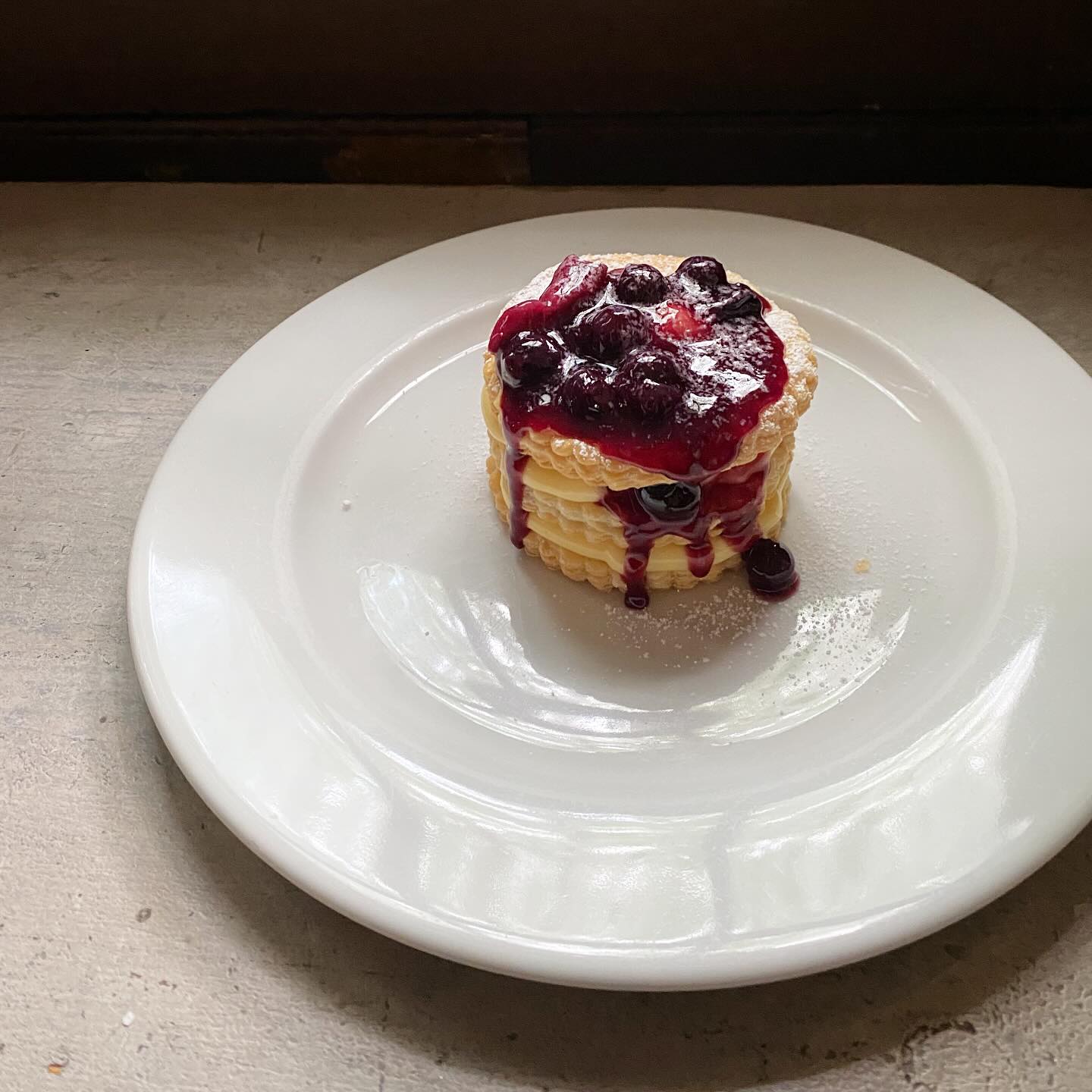 Photo by Chez Nous in Chez Nous. May be an image of souffle, cake, blueberries, crumpet, tart, cheesecake, pancake and text.